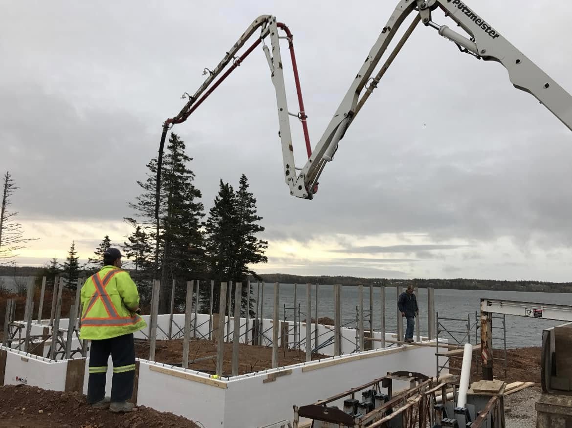 PHR Construction crew pouring an ICF foundation on a waterfront lot